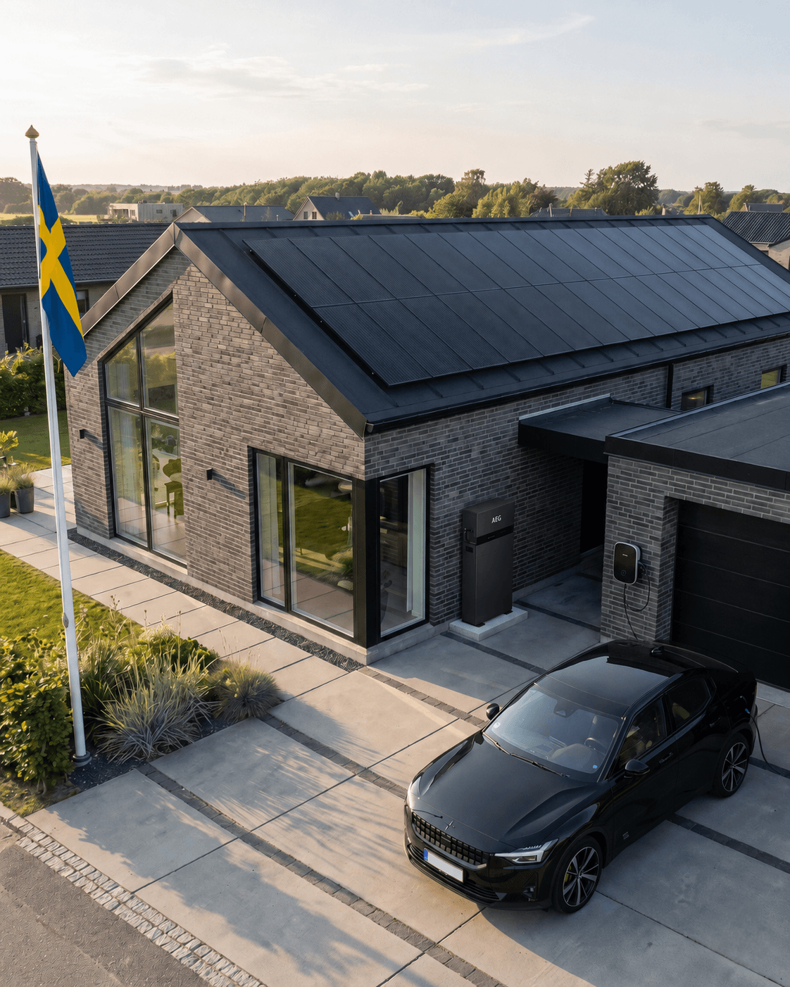 Hus med AEG solceller och batteri